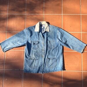 Early 2000s light wash denim jacket with a relaxed boxy fit